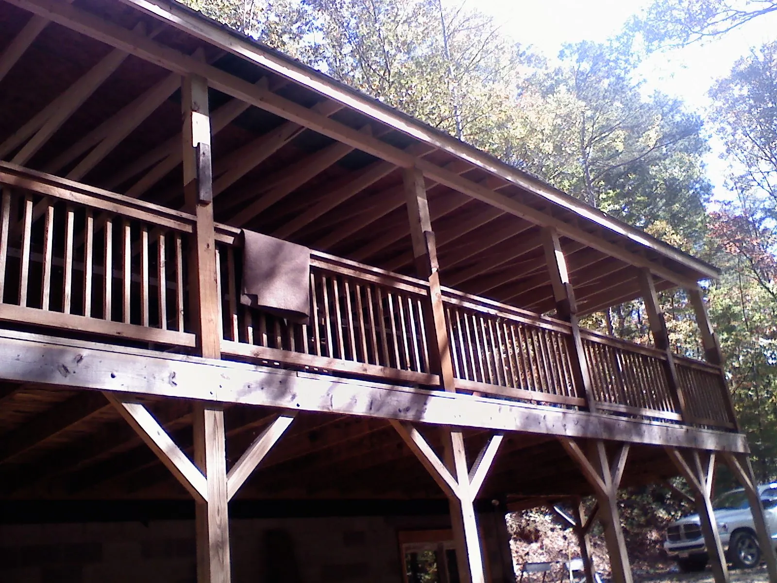 Timber framing under a new elevated porch and deck — Roof Leak Repair in Truxton by Roofing Brothers